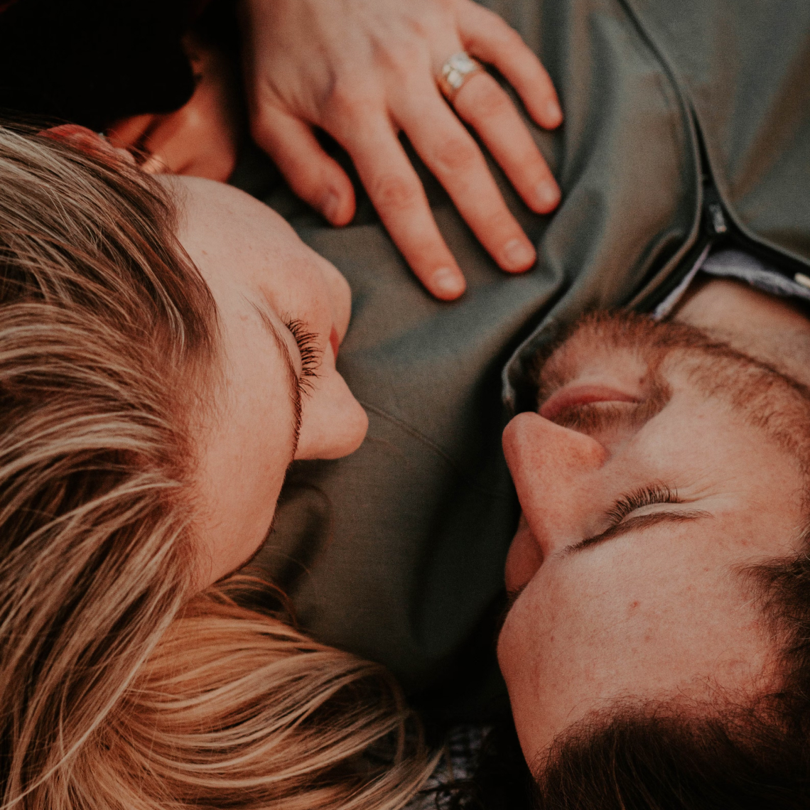 Photo of a couple embracing, by Kenny Eliason, Unsplash